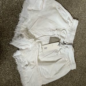 White loose shirts with pockets
